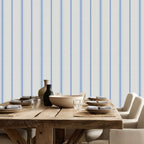 Chalk and French Blue stripe wallpaper styled in a dining room with wood table and neutral decor, showcasing French country and modern farmhouse interiors.