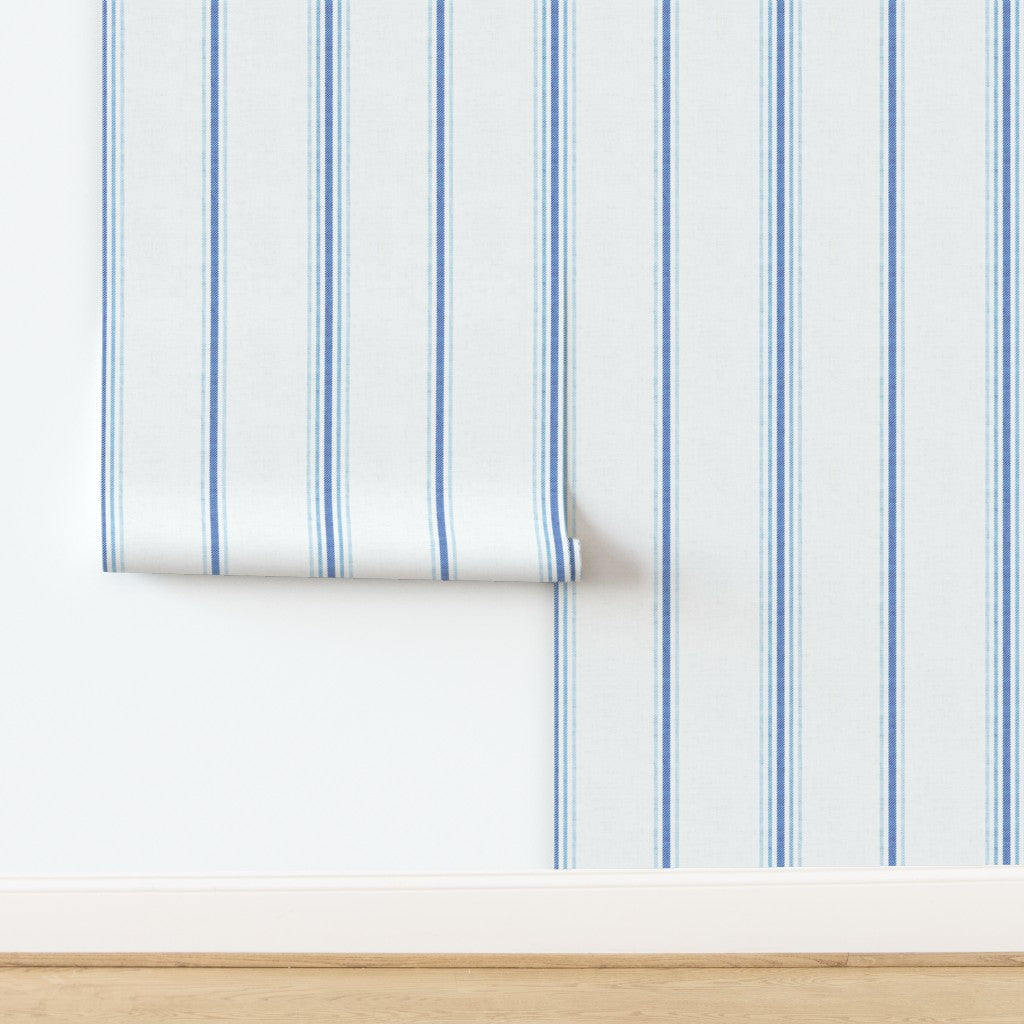 Laurent Stripe wallpaper in Chalk and French Blue shown in a tiled panel layout, illustrating the vertical stripe pattern and repeat for installation.