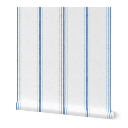 Laurent Stripe wallpaper in Chalk and French Blue featuring a classic vertical stripe pattern, ideal for French country interiors, neutral decor, and cottagecore homes.