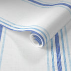 Close-up of Chalk and French Blue stripe wallpaper roll showing textured linen-style background and classic vertical stripe detail.