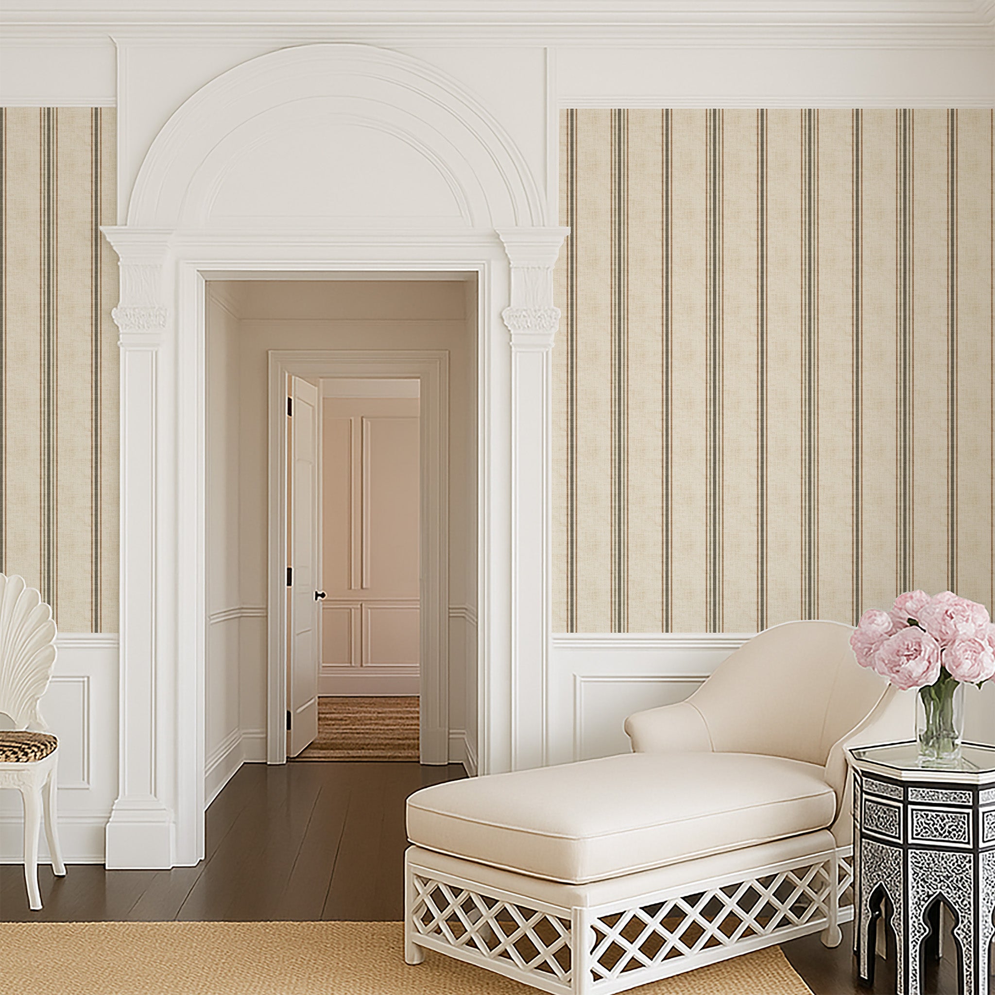 Parchment and olive stripe wallpaper styled in an elegant hallway with arched architecture, highlighting classic French country and timeless interior design.