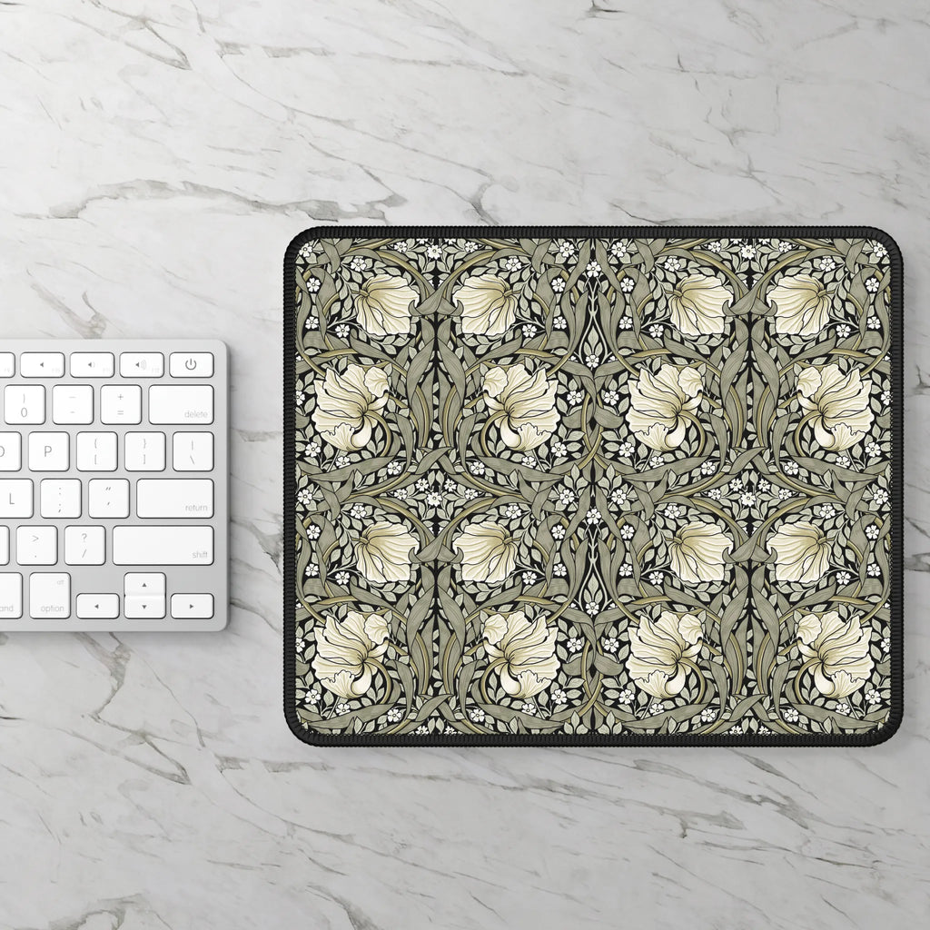 William Morris mouse pad with floral pattern on a marble surface next to a keyboard