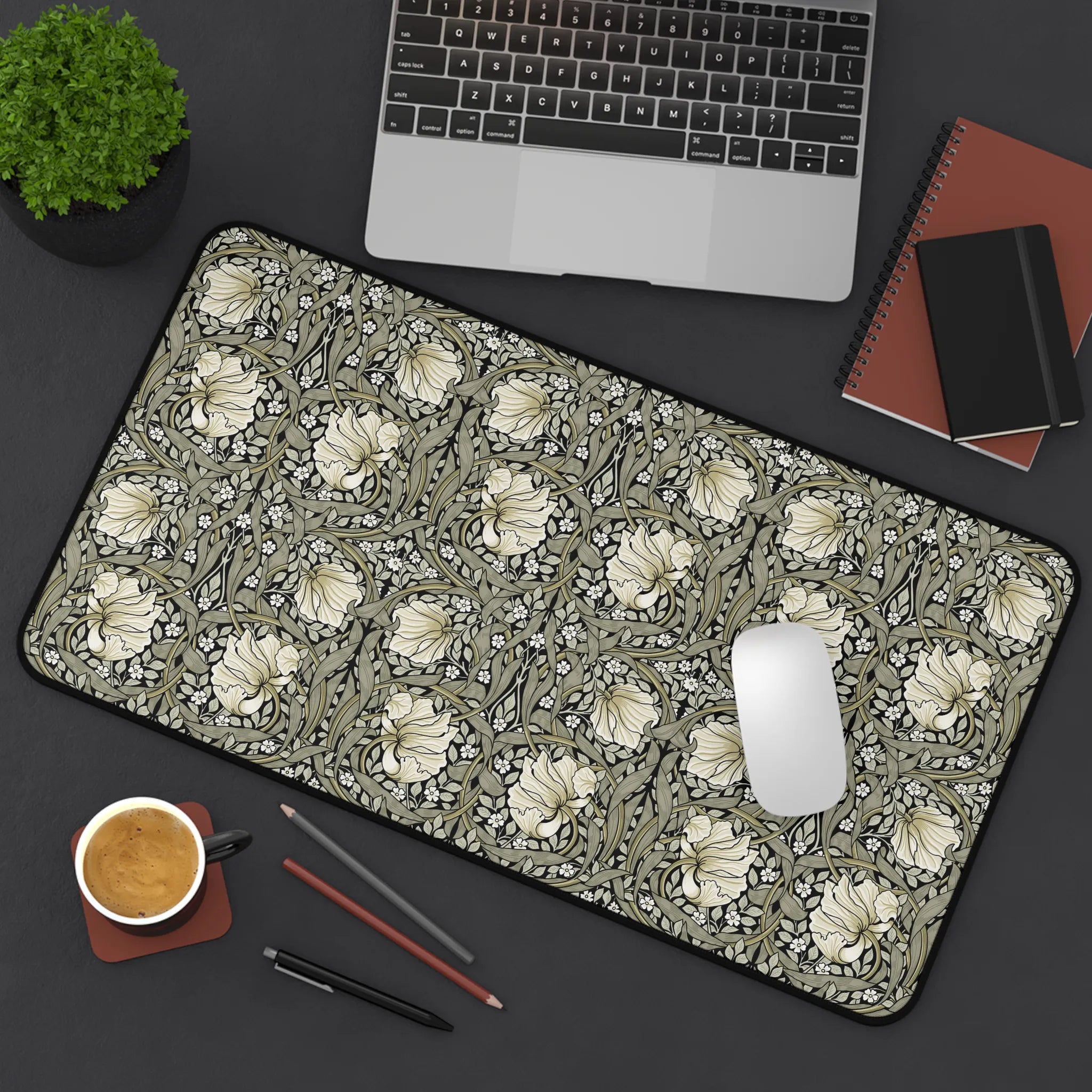 William Morris Pimpernel desk mat on a desk with laptop, notebook, and coffee cup.