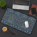 Blackthorn desk mat William Morris featuring flowing vines and floral motifs, adding heritage revival style to a modern home office setup.