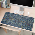 William Morris desk mat Blackthorn styled on a workspace with keyboard and computer, showcasing a classic Arts and Crafts botanical pattern for elegant home office decor.