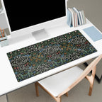 William Morris Blackthorn desk mat styled on a workspace with keyboard and accessories, showcasing a classic Arts and Crafts botanical pattern for elegant home office decor.