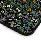 closeup of William Morris desk mat in dramatic Blackthorn