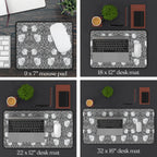 Size chart for William Morris Pimpernel desk mats and mousepads. Set of desk mats in different sizes with a floral pattern on a dark surface.