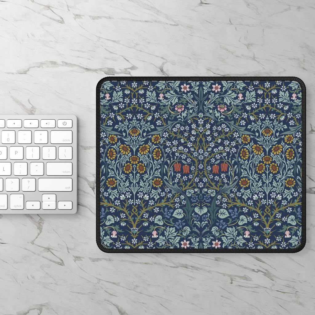 William Morris Blackthorn mousepad styled with a laptop and accessories, showcasing a timeless Arts and Crafts floral design for elegant workspace decor.