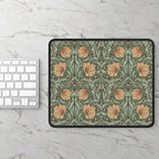 Floral patterned William Morris mouse pad on a marble surface with a keyboard.