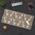 Large William Morris desk mat mousepad with Pimpernel floral pattern on a dark surface with office items.