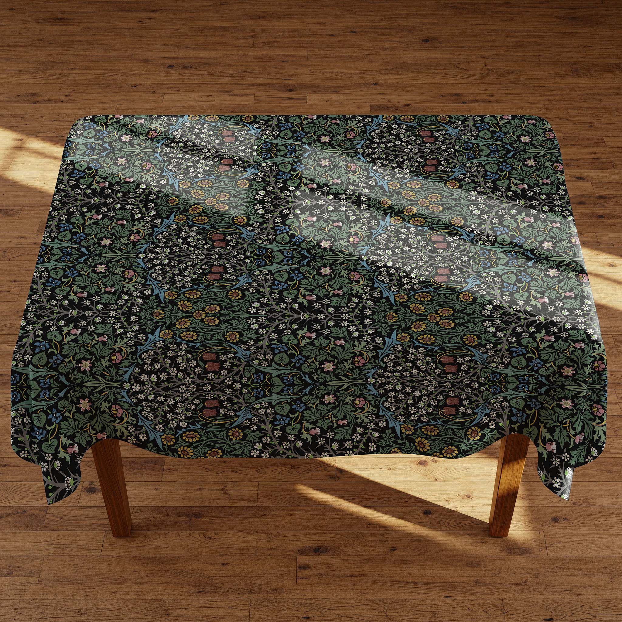 William Morris Blackthorn botanical tablecloth in original black colorway, showcasing classic Arts and Crafts floral design for elegant dining and vintage-inspired decor.