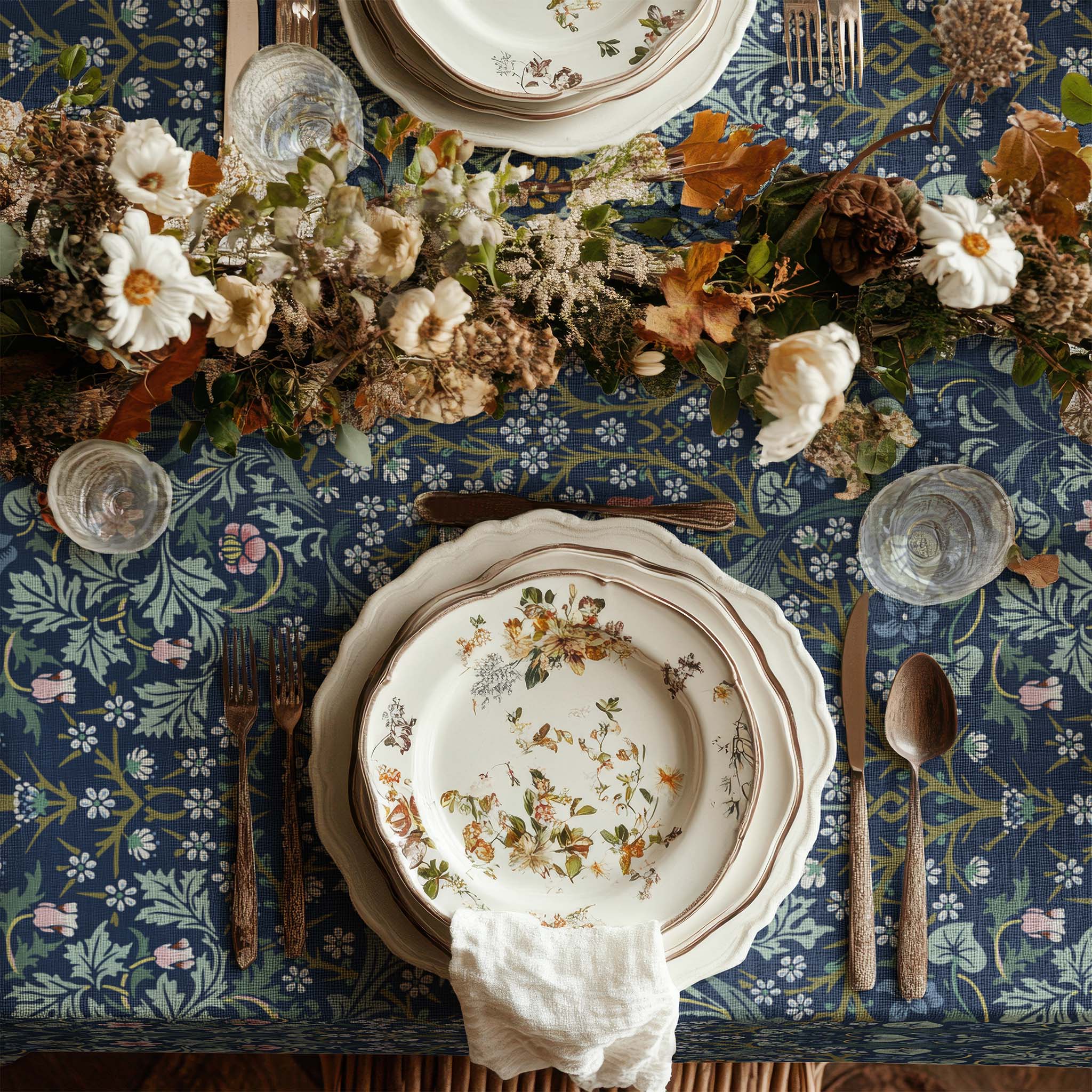 William Morris Blackthorn tablecloth in Dusky Blue Garden featuring an intricate Arts and Crafts botanical pattern, styled for heritage revival dining tables and English country decor.