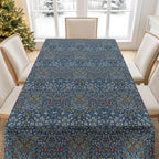 Blackthorn tablecloth by William Morris in Dusky Blue Garden colorway featuring classic botanical design, ideal for heritage interiors and vintage-inspired table settings.