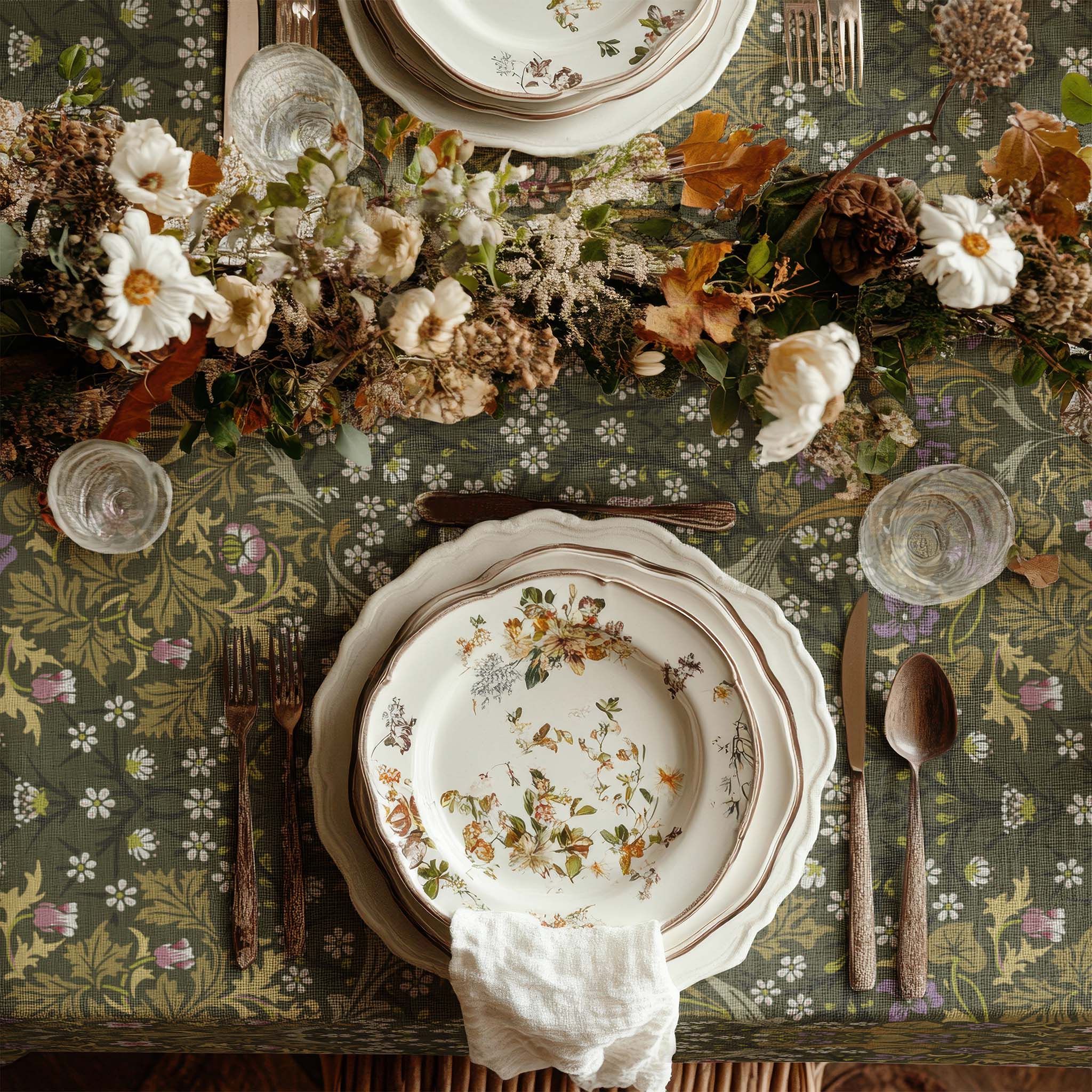 William Morris Blackthorn tablecloth in Sultry Olive Green featuring an intricate Arts and Crafts botanical pattern, styled for heritage revival dining tables and English country decor.