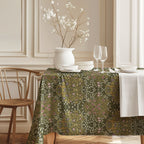 William Morris Blackthorn olive green tablecloth with detailed botanical floral pattern inspired by the Arts and Crafts movement, perfect for cottagecore and traditional dining decor.