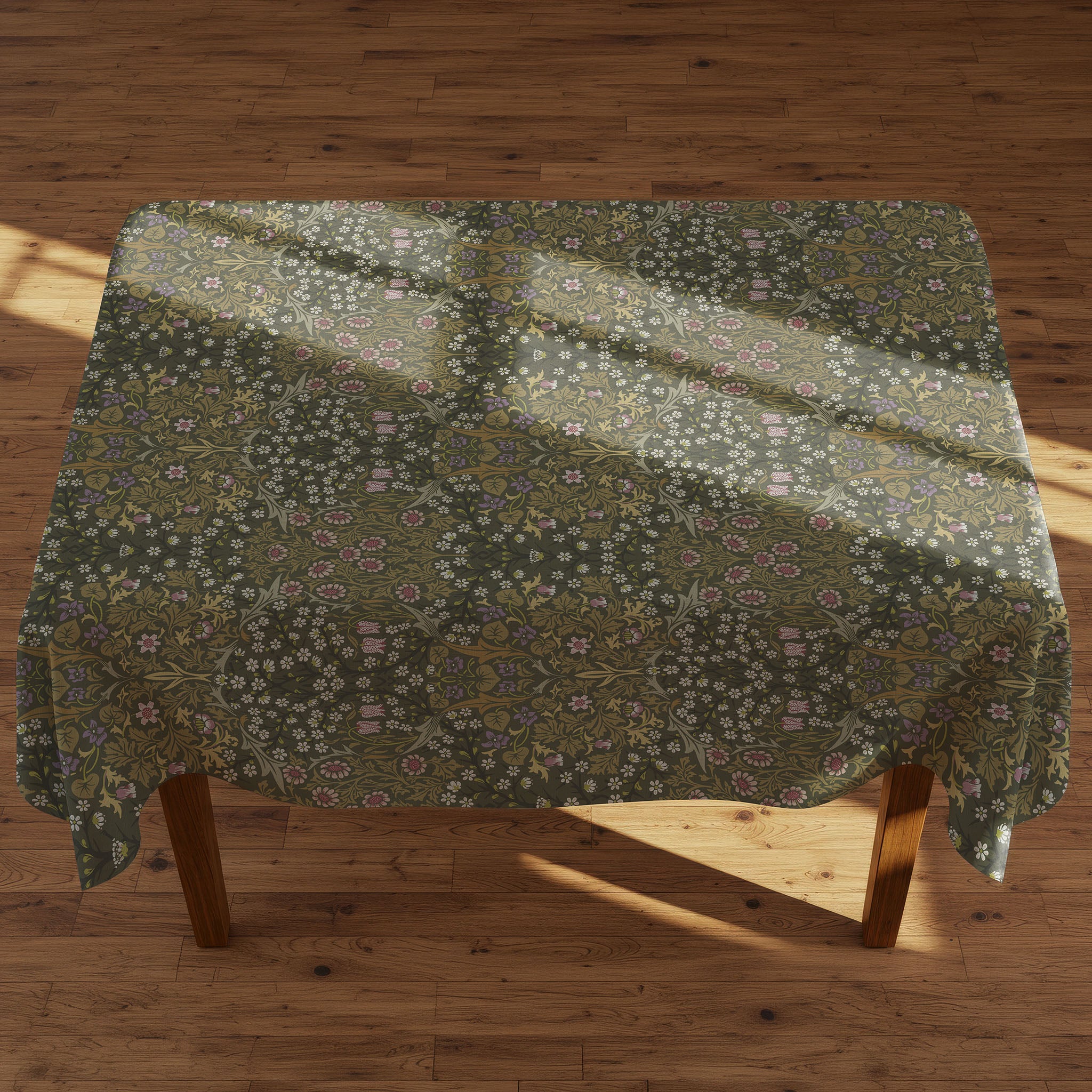 William Morris Blackthorn tablecloth in olive green with intricate vines and floral motifs, styled for farmhouse tablescapes and English country dining rooms.