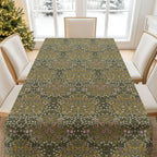 Blackthorn tablecloth by William Morris in a olive green featuring classic botanical design, ideal for heritage interiors and vintage-inspired table settings.