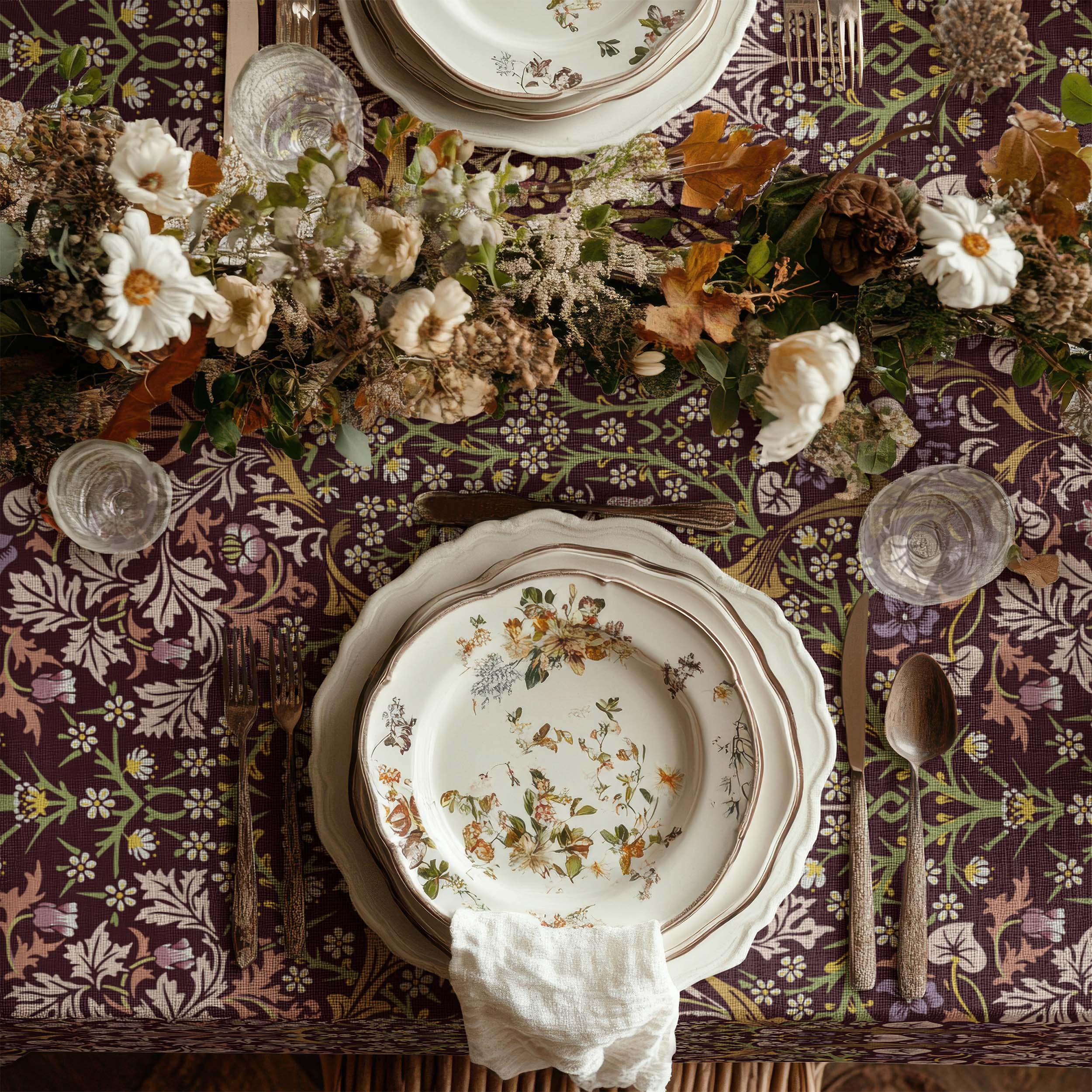 William Morris tablecloth in maroon Blackthorn featuring an intricate Arts and Crafts botanical pattern, styled for heritage revival dining tables and English country decor.