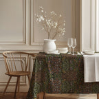 William Morris Blackthorn earth tone tablecloth with detailed botanical floral pattern inspired by the Arts and Crafts movement, perfect for cottagecore and traditional dining decor.