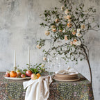 William Morris Blackthorn tablecloth in earth tone Secret Garden colorway with intricate vines and floral motifs, styled for cottagecore tablescapes and English country dining rooms.
