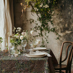 William Morris Blackthorn tablecloth in Secret Garden earth tone with intricate vines and floral motifs, styled for cottagecore tablescapes and English country dining rooms.