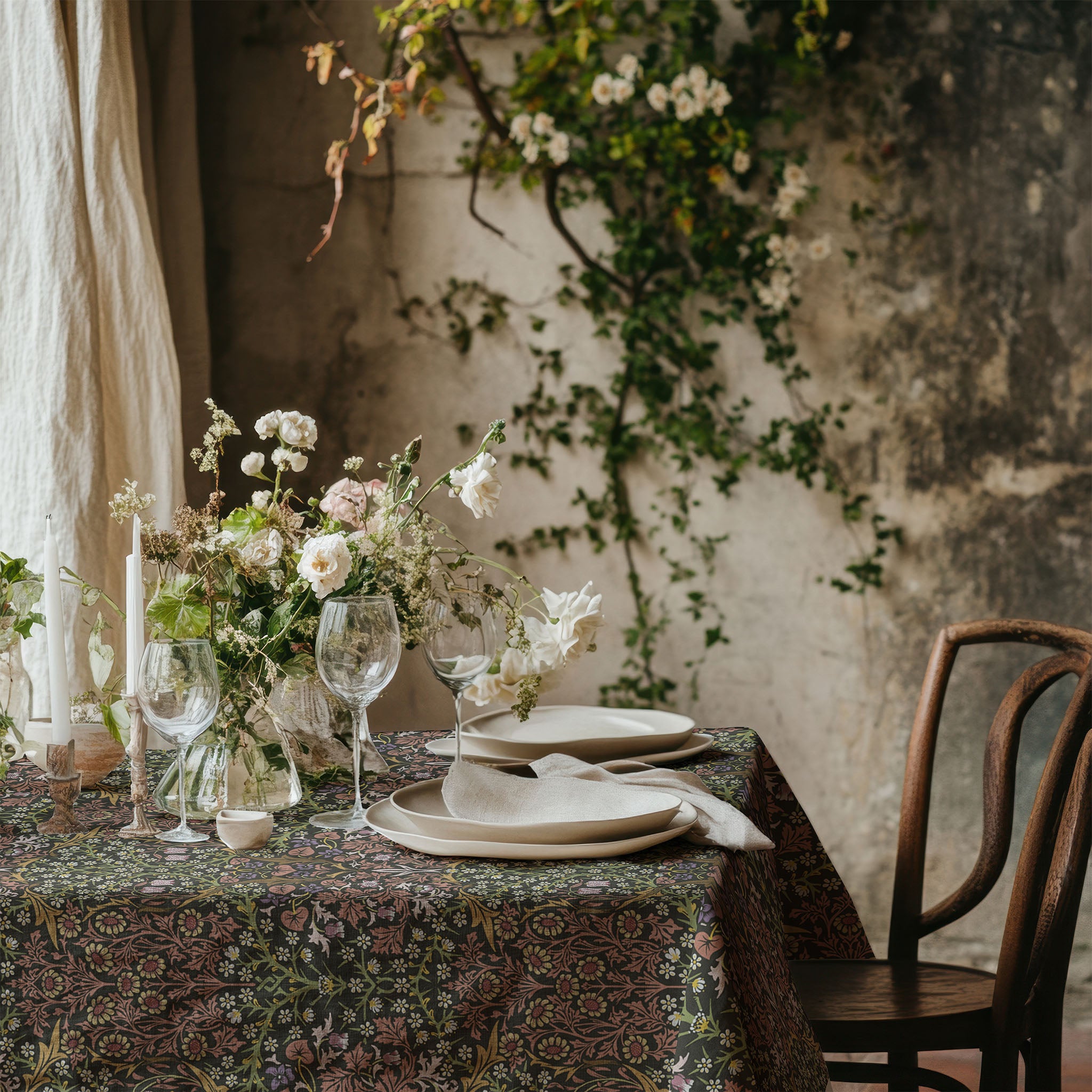 William Morris Blackthorn tablecloth in Secret Garden earth tone with intricate vines and floral motifs, styled for cottagecore tablescapes and English country dining rooms.