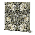 William Morris Pimpernel wallpaper featuring an intricate Arts and Crafts botanical pattern with flowing vines and stylized flowers, perfect for heritage revival interiors and classic English country decor.