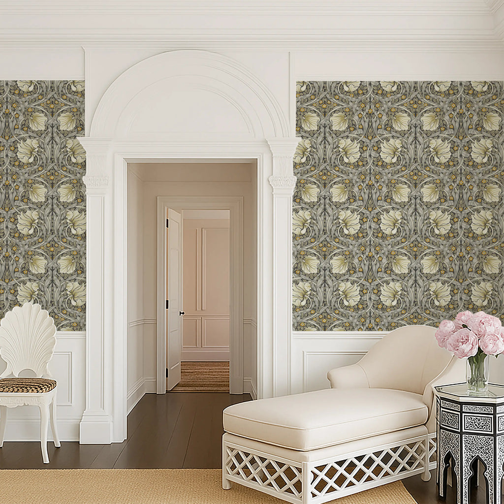 William Morris Pimpernel wallpaper in Heritage Greige and Ochre styled in an elegant hallway with arched doorway.