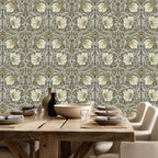 William Morris Pimpernel wallpaper styled in a dining room with wooden table and classic decor, showcasing the timeless Arts and Crafts botanical pattern in a heritage revival interior.