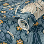 Close-up of a roll of wallpaper with floral William Morris wallpaper.
