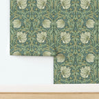 Close-up detail of William Morris Pimpernel wallpaper in Heritage Green, showing fine linework and layered botanical motifs.