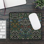 William Morris mousepad in Blackthorn, styled with a laptop and accessories, showcasing a timeless Arts and Crafts floral design for elegant workspace decor.