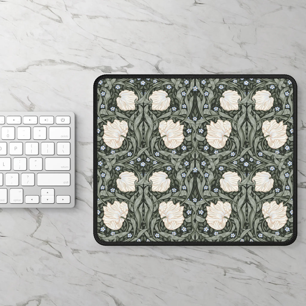 Pimpernel by William Morris mouse pad on a marble surface with a keyboard