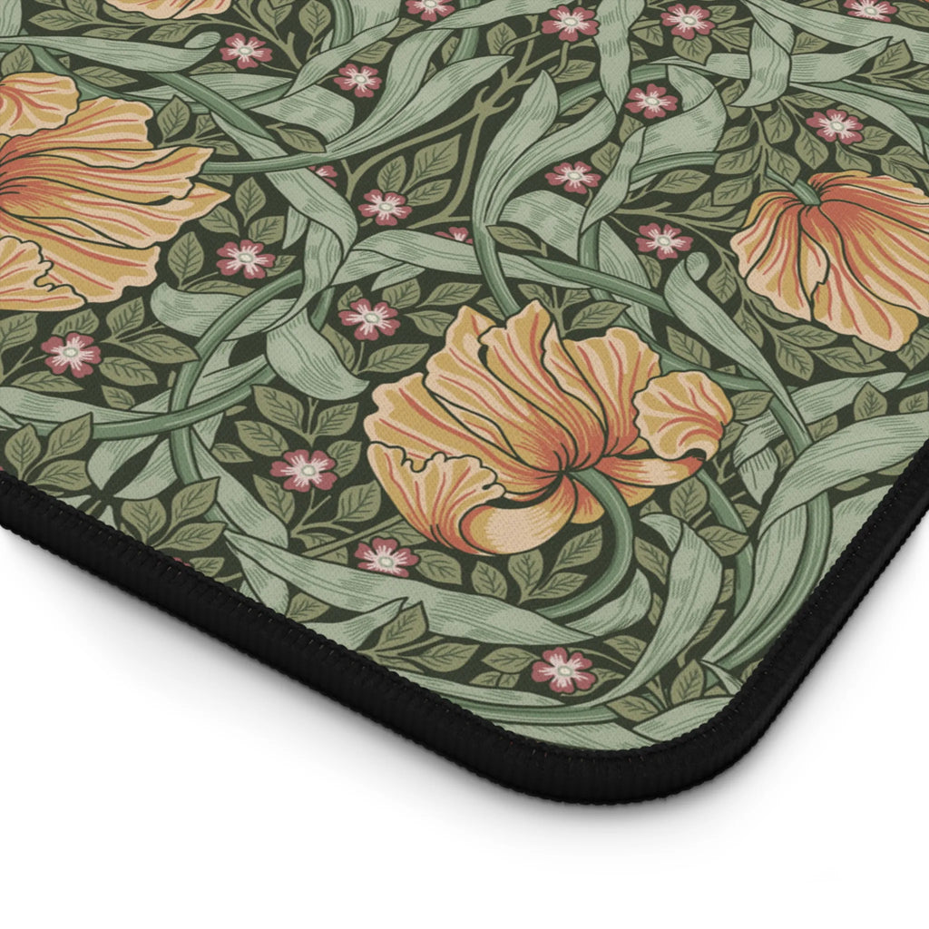Floral patterned William Morris Pimpernel mouse pad with orange flowers and green leaves on a white background