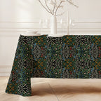 William Morris Blackthorn tablecloth in Dramatic Black featuring an intricate Arts and Crafts botanical pattern, styled for heritage revival dining tables and English country decor.