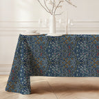 William Morris Blackthorn tablecloth in Dusky Blue Garden featuring an intricate Arts and Crafts botanical pattern, styled for heritage revival dining tables and English country decor.