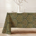 William Morris Blackthorn tablecloth in Sultry Olive Green featuring an intricate Arts and Crafts botanical pattern, styled for heritage revival dining tables and English country decor.