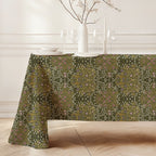 William Morris Blackthorn tablecloth in Sultry Olive Green featuring an intricate Arts and Crafts botanical pattern, styled for heritage revival dining tables and English country decor.