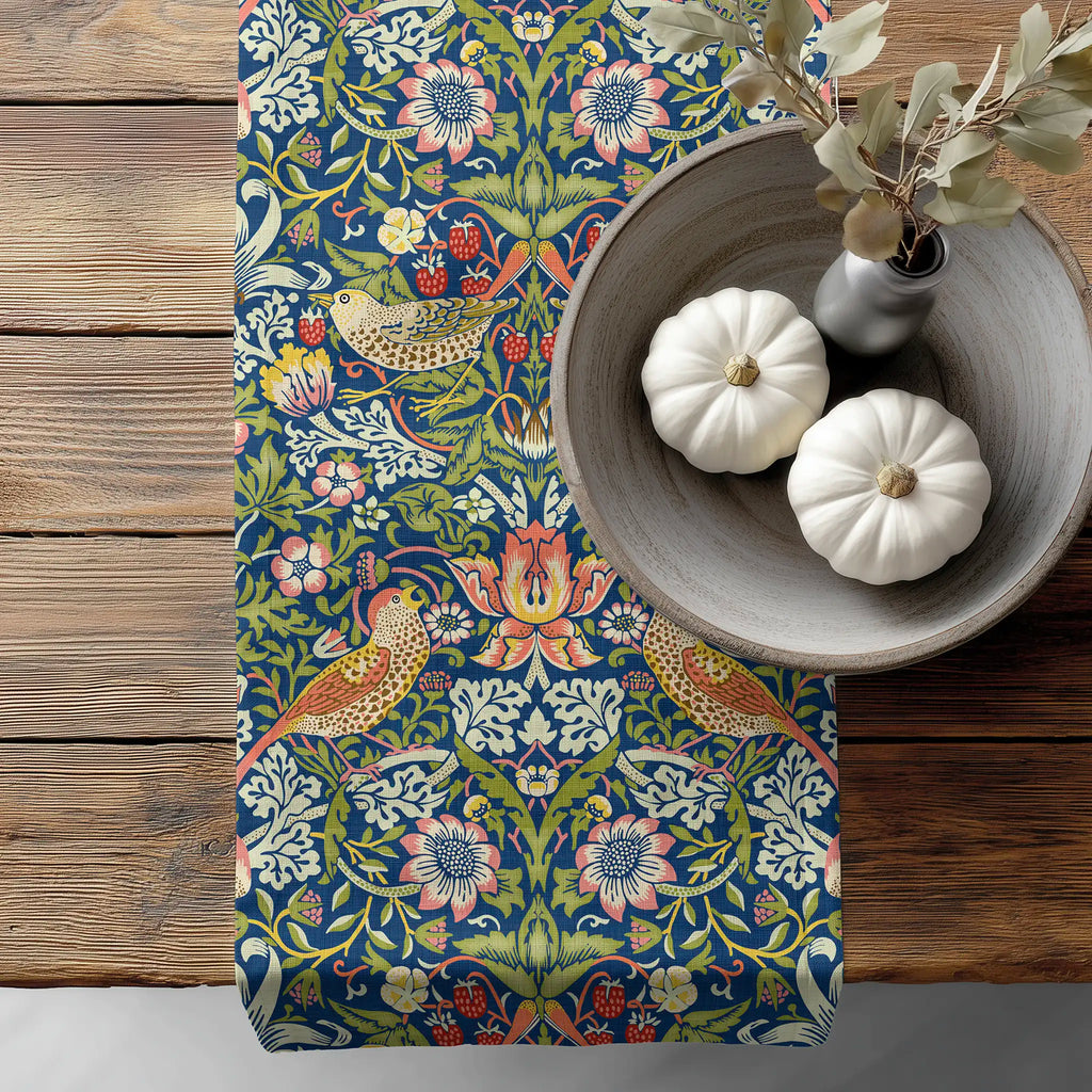 William Morris Strawberry Thief table runner with classic Arts and Crafts birds and strawberry vines, styled for cottagecore tablescapes and traditional English country dining.