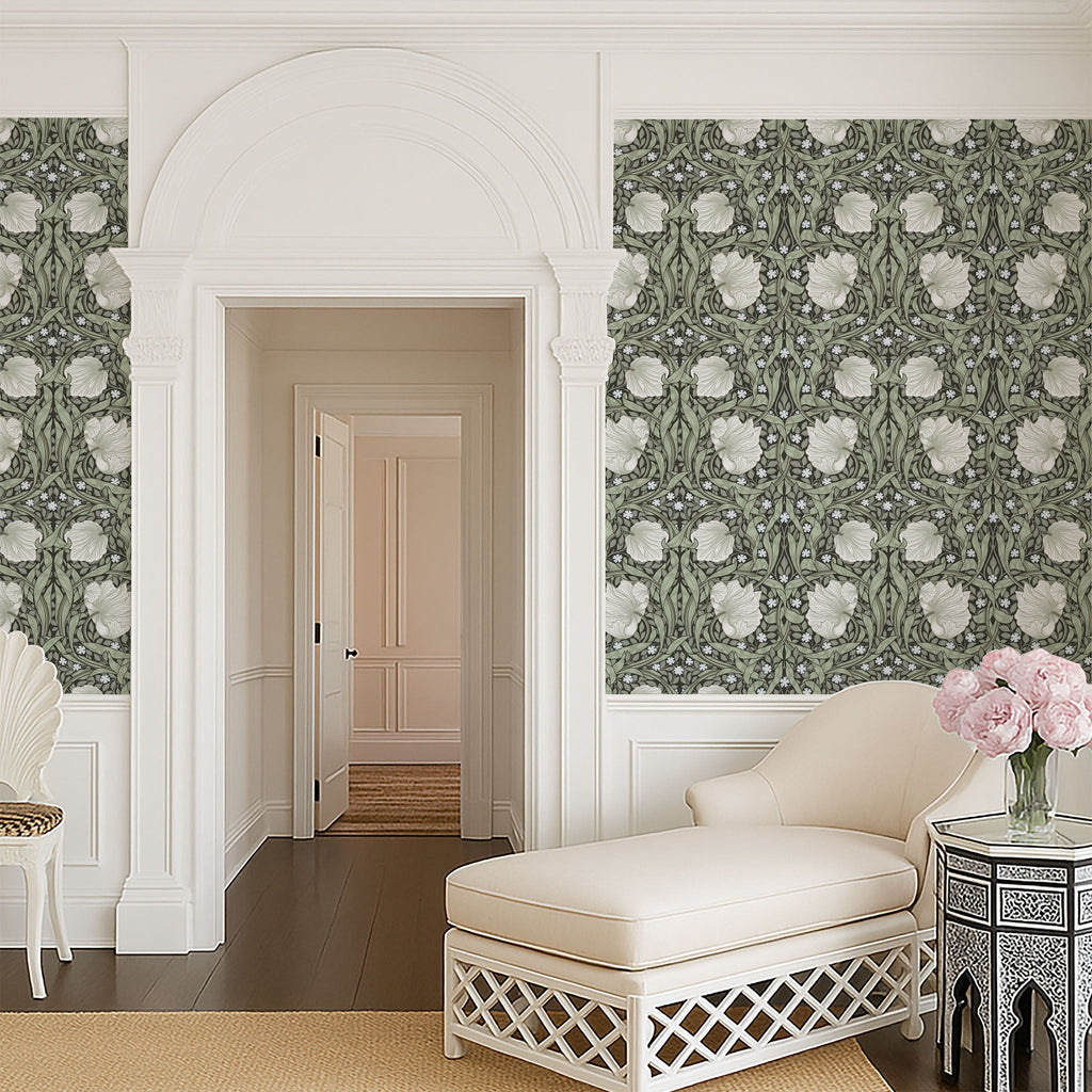 William Morris Pimpernel wallpaper in Dreamy Sage styled in an elegant hallway with arched doorway.