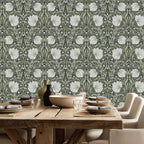 William Morris Pimpernel wallpaper styled in a dining room with wooden table and classic decor, showcasing the timeless Arts and Crafts botanical pattern in a heritage revival interior.