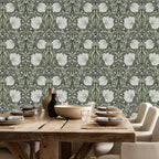 Dining room with wooden table and William Morris Pimpernel wallpaper in Dreamy Sage.