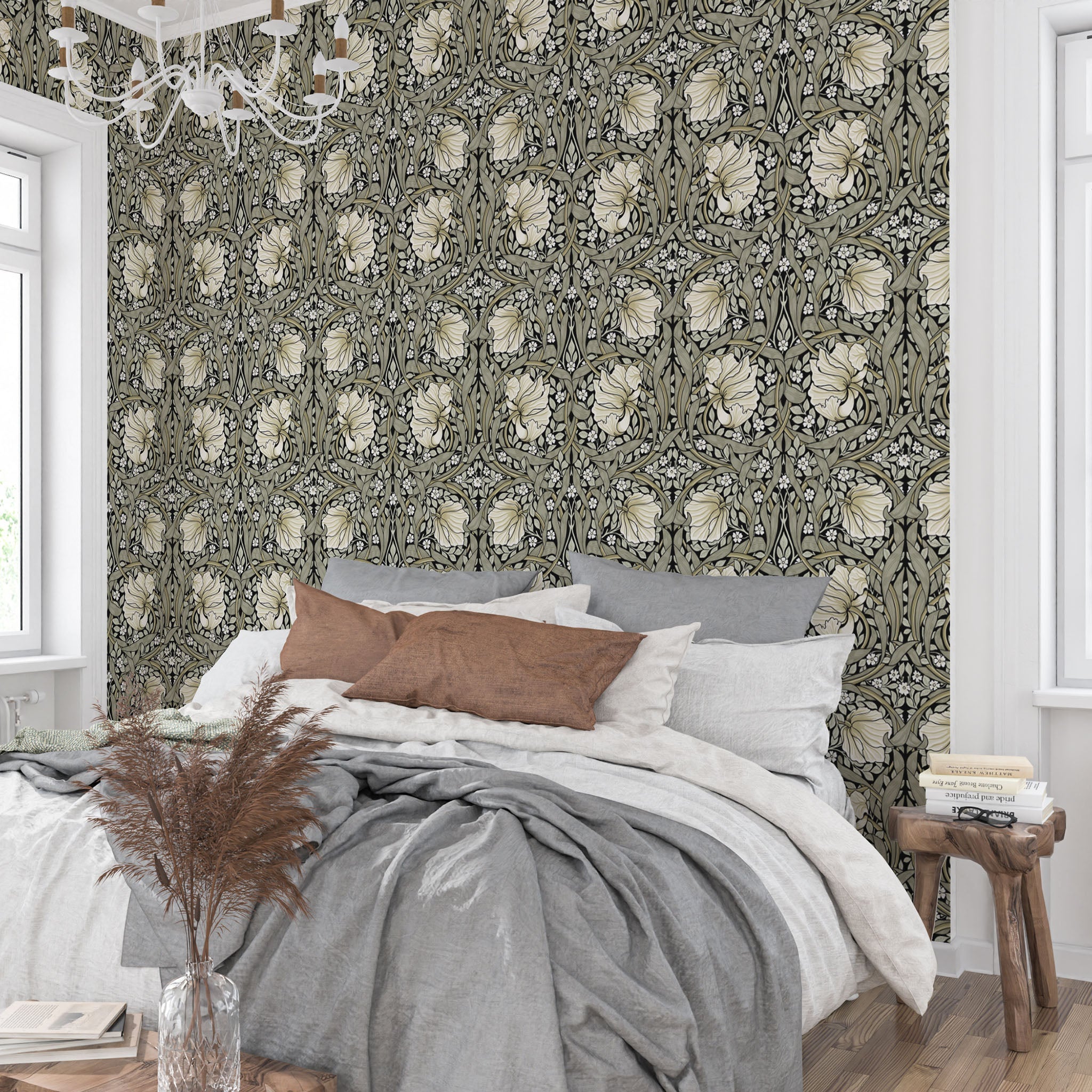 Bedroom styled with William Morris Pimpernel wallpaper in Sage & Cream on Ebony behind the bed.