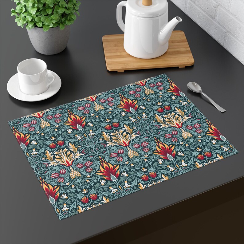 William Morris Snakeshead placemat flat lay showing the Teal & Garnet colorway.