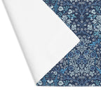William Morris Blackthorn placemat in Blue styled with floral accents on table