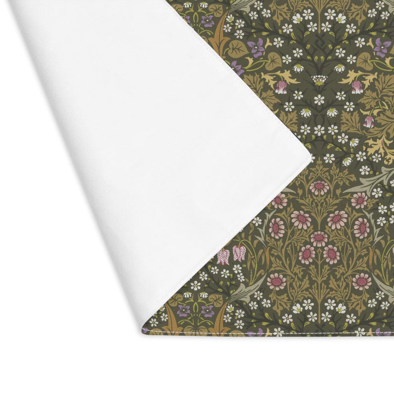 William Morris Blackthorn placemat in Olive Green styled with floral accents on table