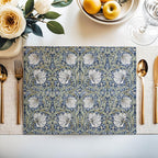 Close-up of the Pimpernel floral pattern in Navy and Sage on cotton twill placemat