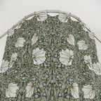 William Morris Pimpernel shower curtain in Morning Sage 2984, ivory tulips and fresh green leaves on a soft morning-sage ground, styled in a bathroom. A handmade extra long cotton sateen shower curtain in 84, 96 and 108 inch lengths.